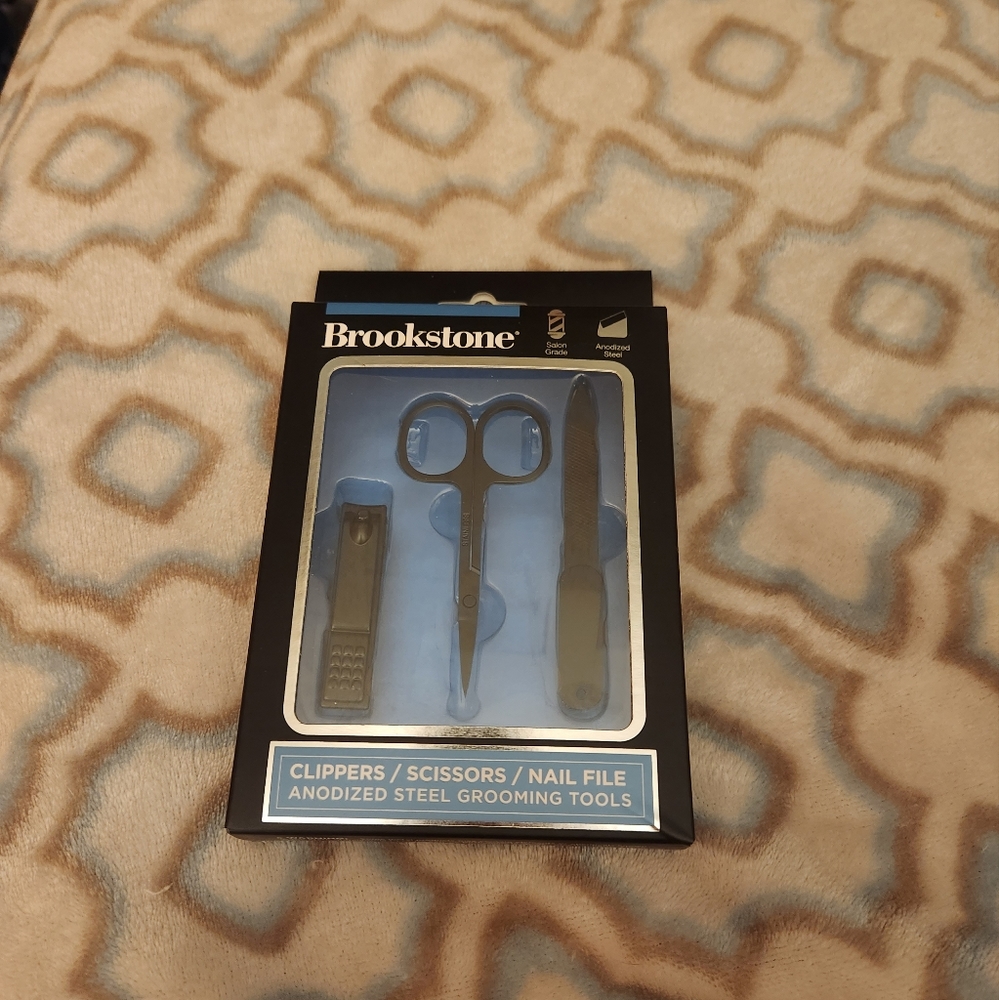 Brookstone anodized steel grooming tools (clippers/sissors/nail file)